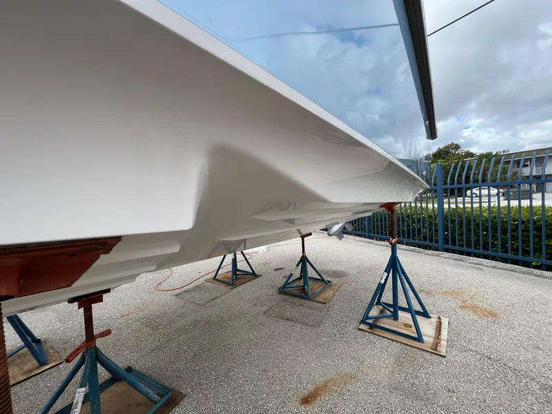Slide: The Image of 2024 Nimbus Commuter 9 #136 boat hull on stands. - 30
