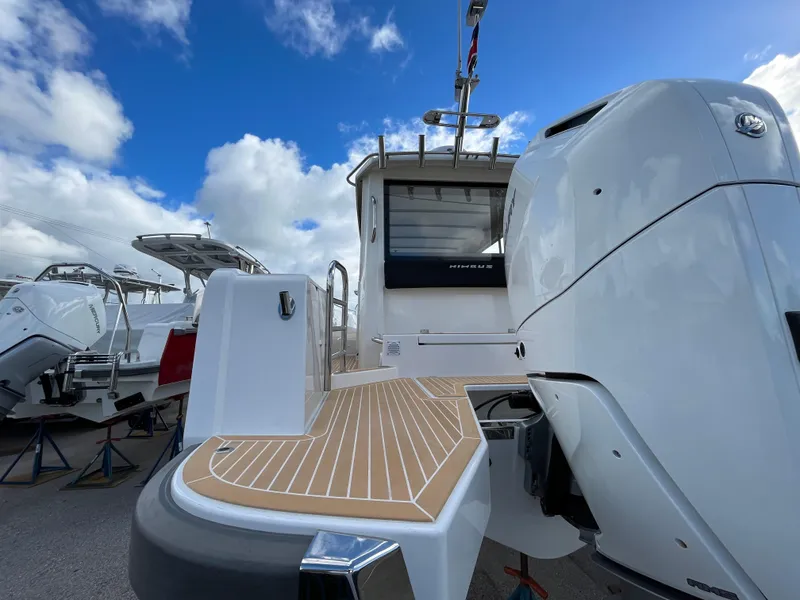 Slide: The Image of 2024 Nimbus Commuter 9 #136 boat with outboard motor and teak deck. - 4