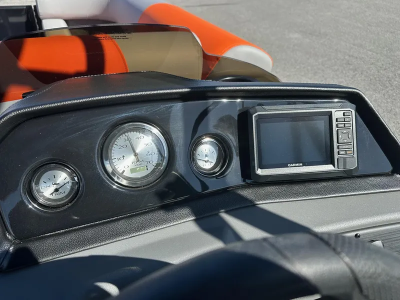 Slide: The Image of Dashboard of 2025 Bennington 21 SSR Quad Bench with Garmin display and gauges. - 34