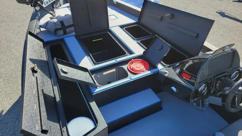 Slide: The Image of 2025 Xpress H20C Crappie boat interior with storage compartments and Yamaha Vmax 175 engine. - 12
