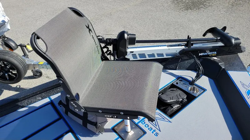 Slide: The Image of 2025 Xpress H20C Crappie boat with Minn Kota Ultrex motor and seating. - 13