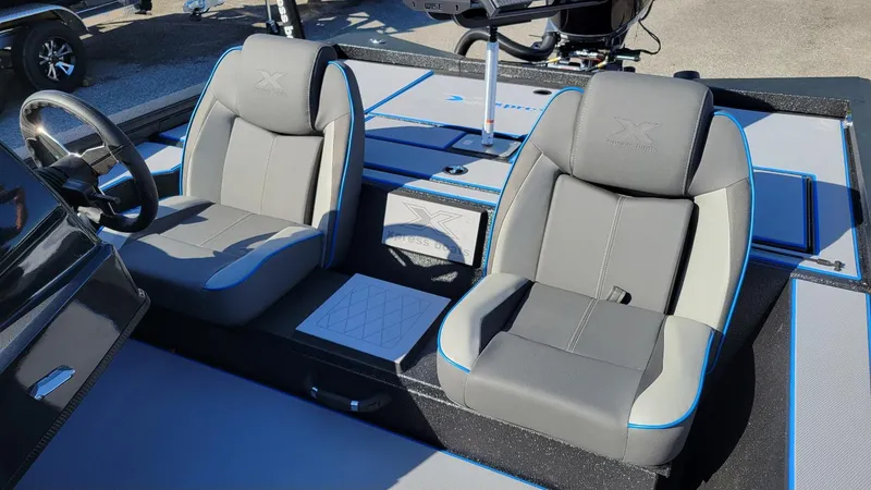 Slide: The Image of 2025 Xpress H20C Crappie boat interior with Yamaha Vmax 175, featuring dual seats. - 15