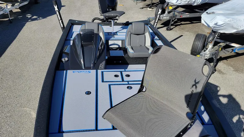 Slide: The Image of 2025 Xpress H20C Crappie boat with Yamaha Vmax 175, featuring spacious seating and deck. - 5