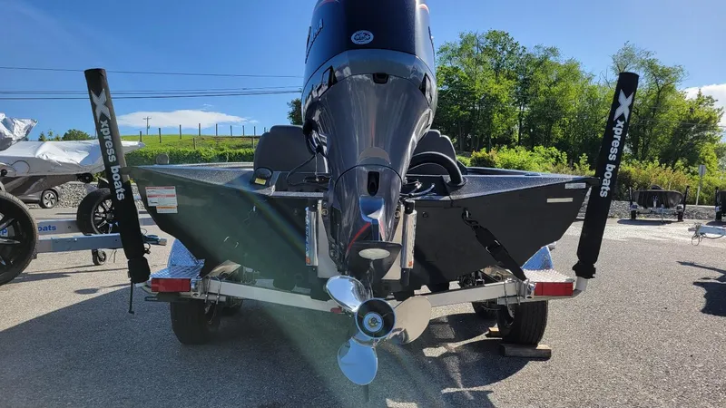 Slide: The Image of 2025 Xpress H20C Crappie boat with Yamaha Vmax 175 engine, rear view on trailer. - 9