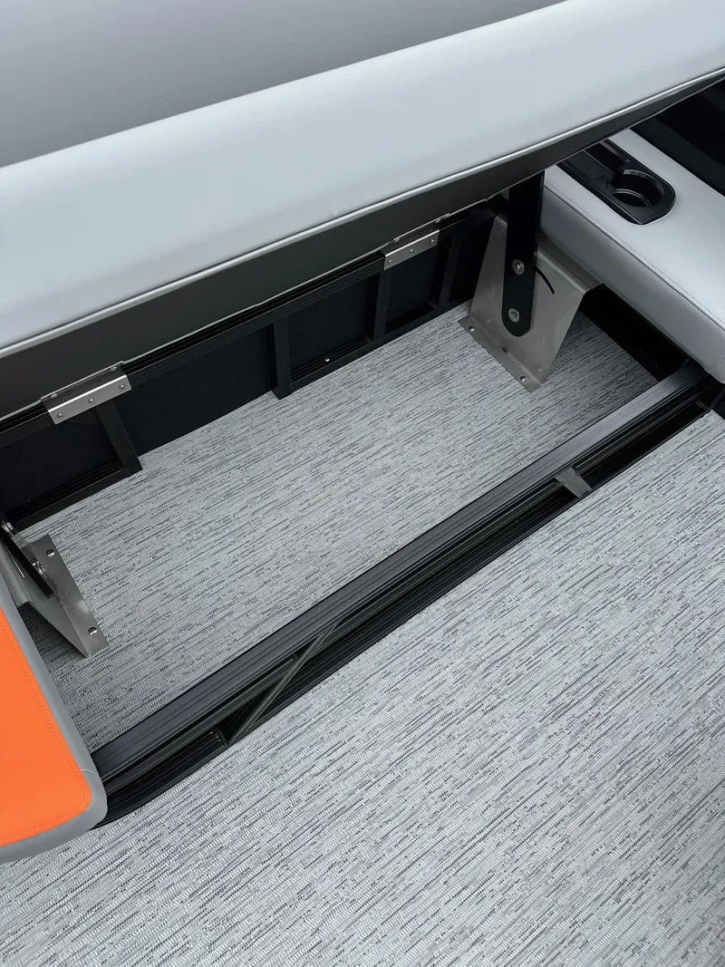 Slide: The Image of 2025 Bennington 22 SSB Swing Back interior seating and flooring detail. - 15