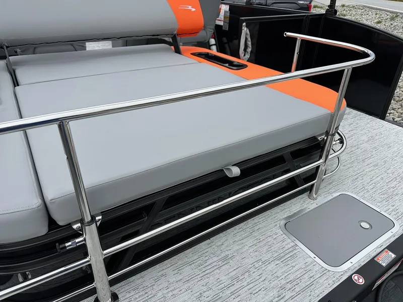 Slide: The Image of 2025 Bennington 22 SSB Swing Back boat with sleek seating and stainless steel railing. - 16