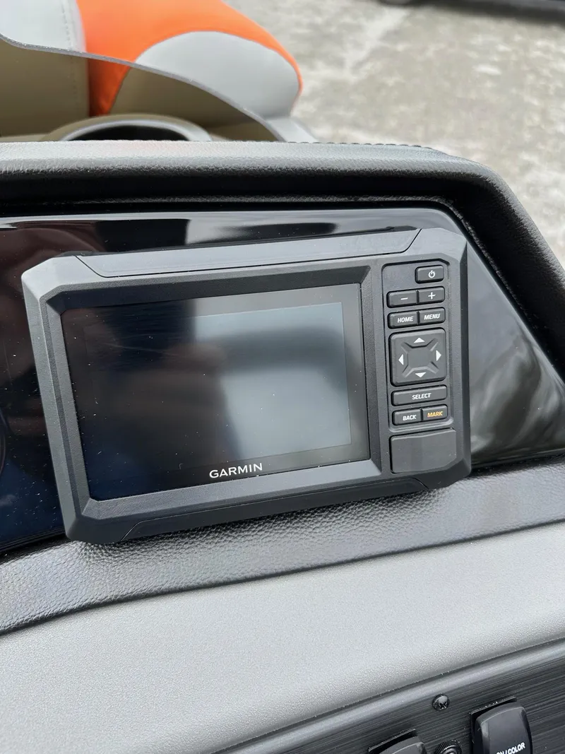 Slide: The Image of Garmin navigation system on 2025 Bennington 22 SSB Swing Back boat dashboard. - 23
