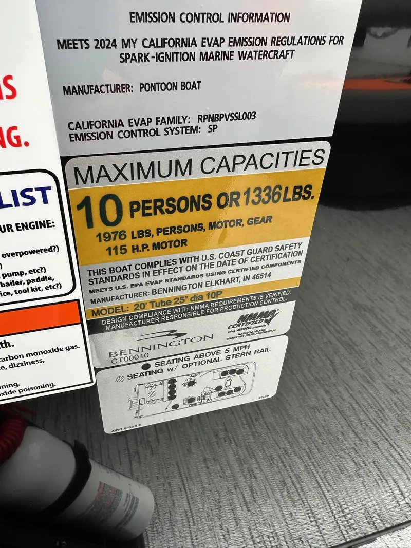 Slide: The Image of 2025 Bennington 22 SSB Swing Back capacity label, 10 persons or 1336 lbs, emission compliant. - 25