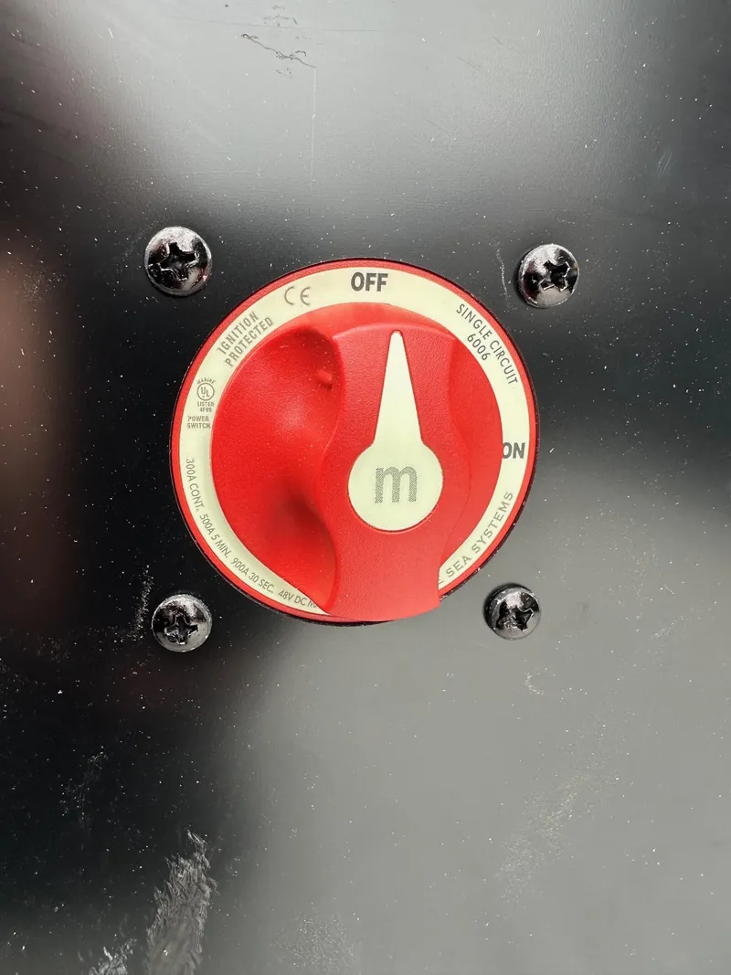 Slide: The Image of Red power switch on a 2025 Bennington 22 SSB Swing Back boat. - 31