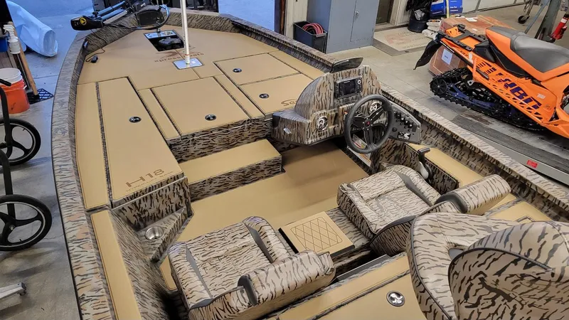 Slide: The Image of 2025 Xpress H18 Bass boat with Yamaha Vmax 115, camo interior, in stock. - 4