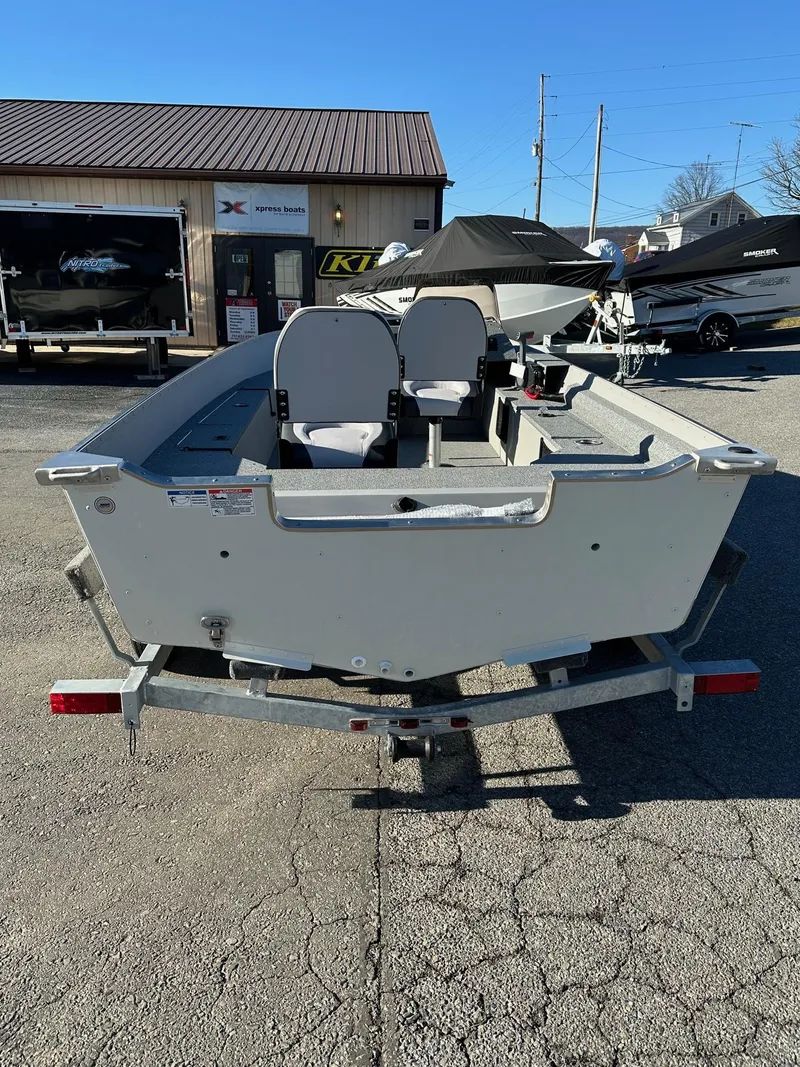 Slide: The Image of 2025 Smoker Craft 16 Angler Patriot SC fishing boat, rear view, in stock. - 12