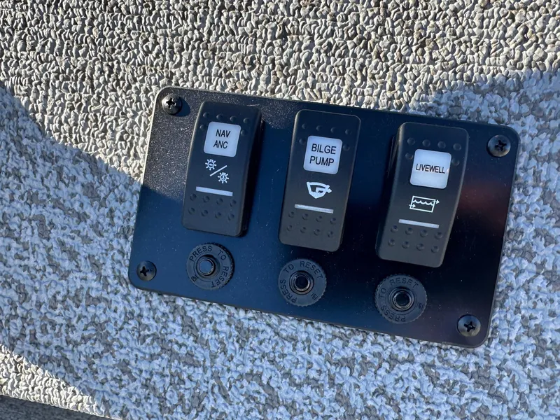 Slide: The Image of Control panel of 2025 Smoker Craft 16 Angler Patriot SC fishing boat. - 15