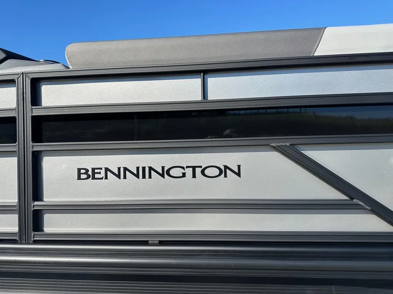 Slide: The Image of 2025 Bennington 20 SSB SwingBack Tritoon, featuring sleek design and branding. - 15