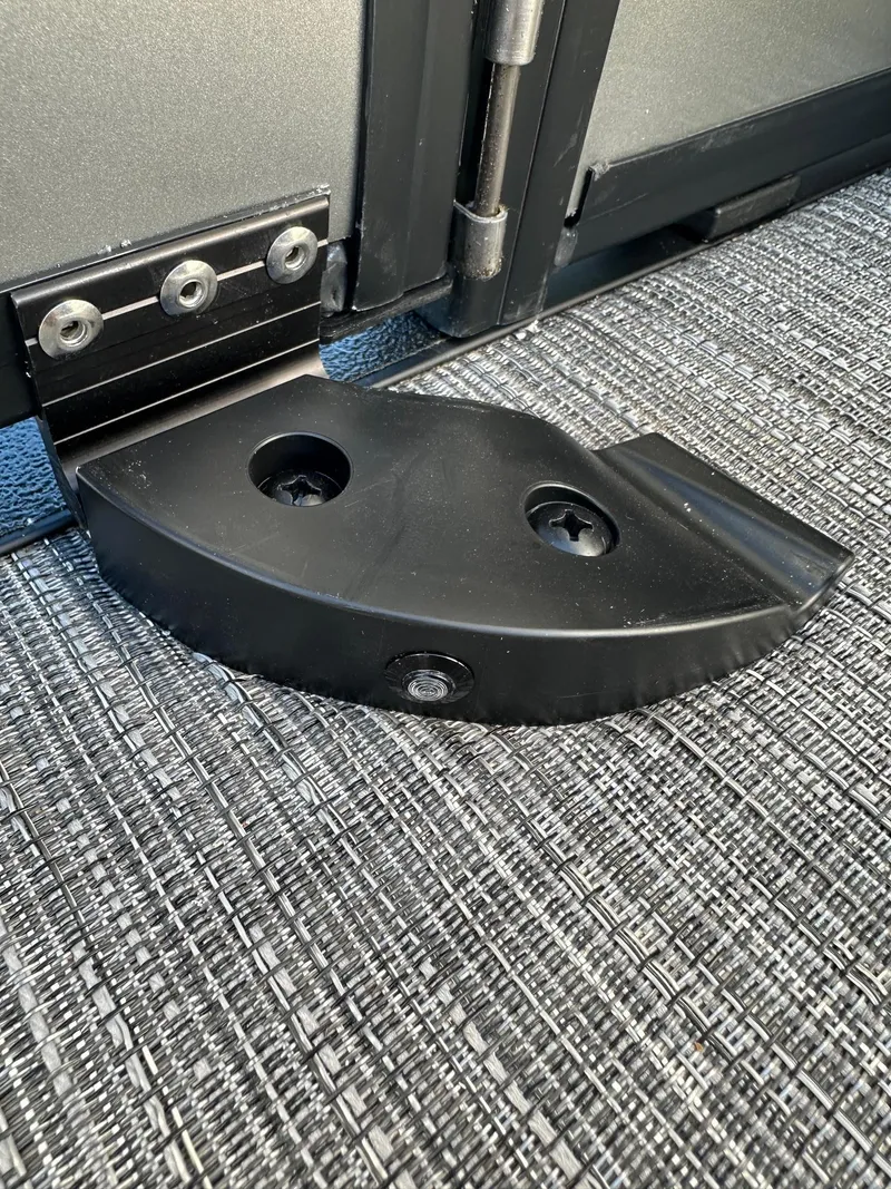 Slide: The Image of Close-up of a hinge mechanism on a 2025 Bennington 20 SSB SwingBack Tritoon. - 18