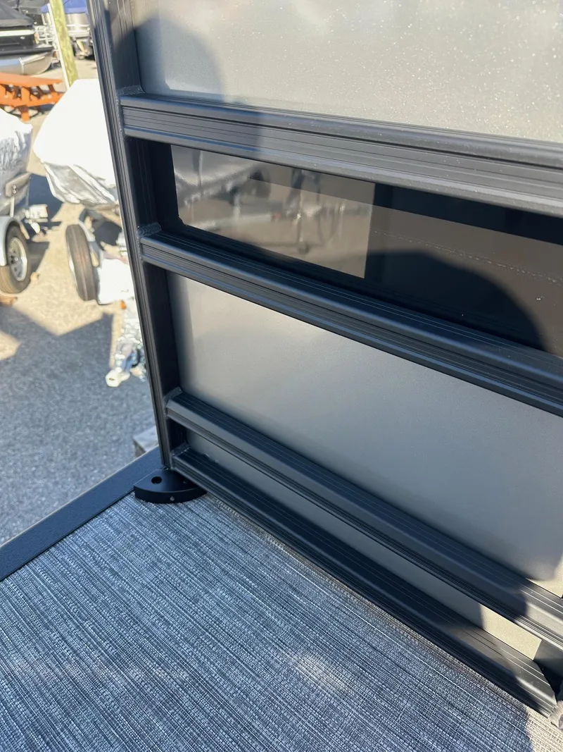 Slide: The Image of Close-up of 2025 Bennington 20 SSB Tritoon railing and flooring detail. - 19