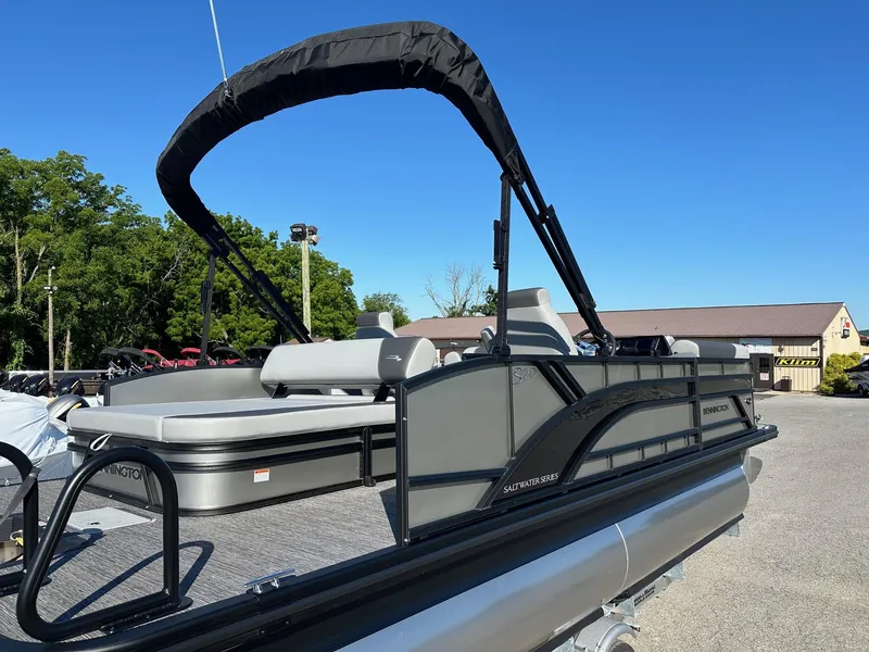 Slide: The Image of 2025 Bennington 20 SSB SwingBack Tritoon with Yamaha VF-150 VMax SHO, parked on trailer. - 25