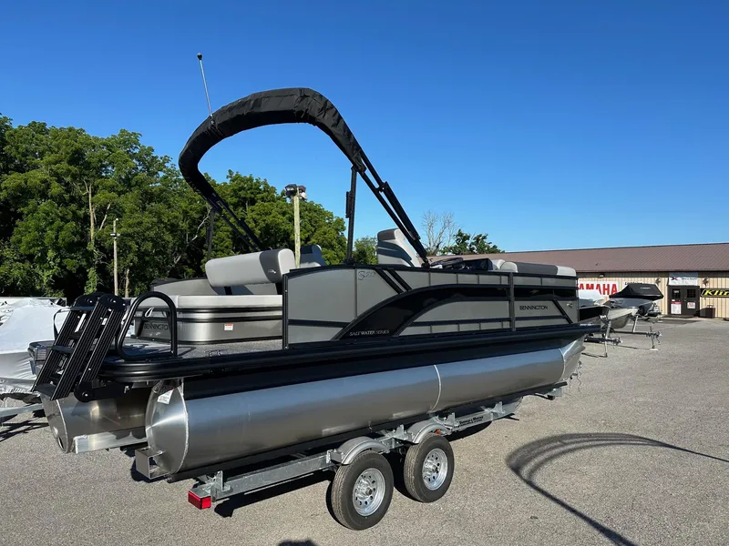Slide: The Image of 2025 Bennington 20 SSB SwingBack Tritoon with Yamaha VF-150 VMax SHO on trailer. - 3