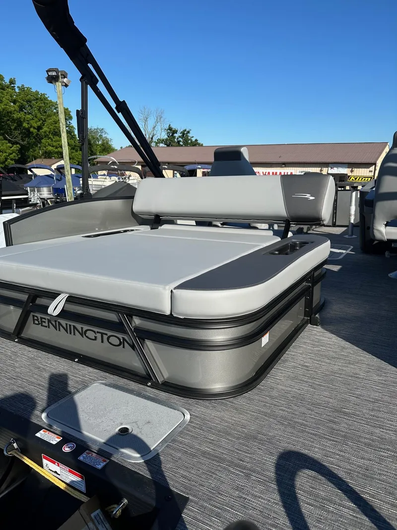 Slide: The Image of 2025 Bennington 20 SSB SwingBack Tritoon with Yamaha VF-150 VMax SHO, displayed outdoors. - 6