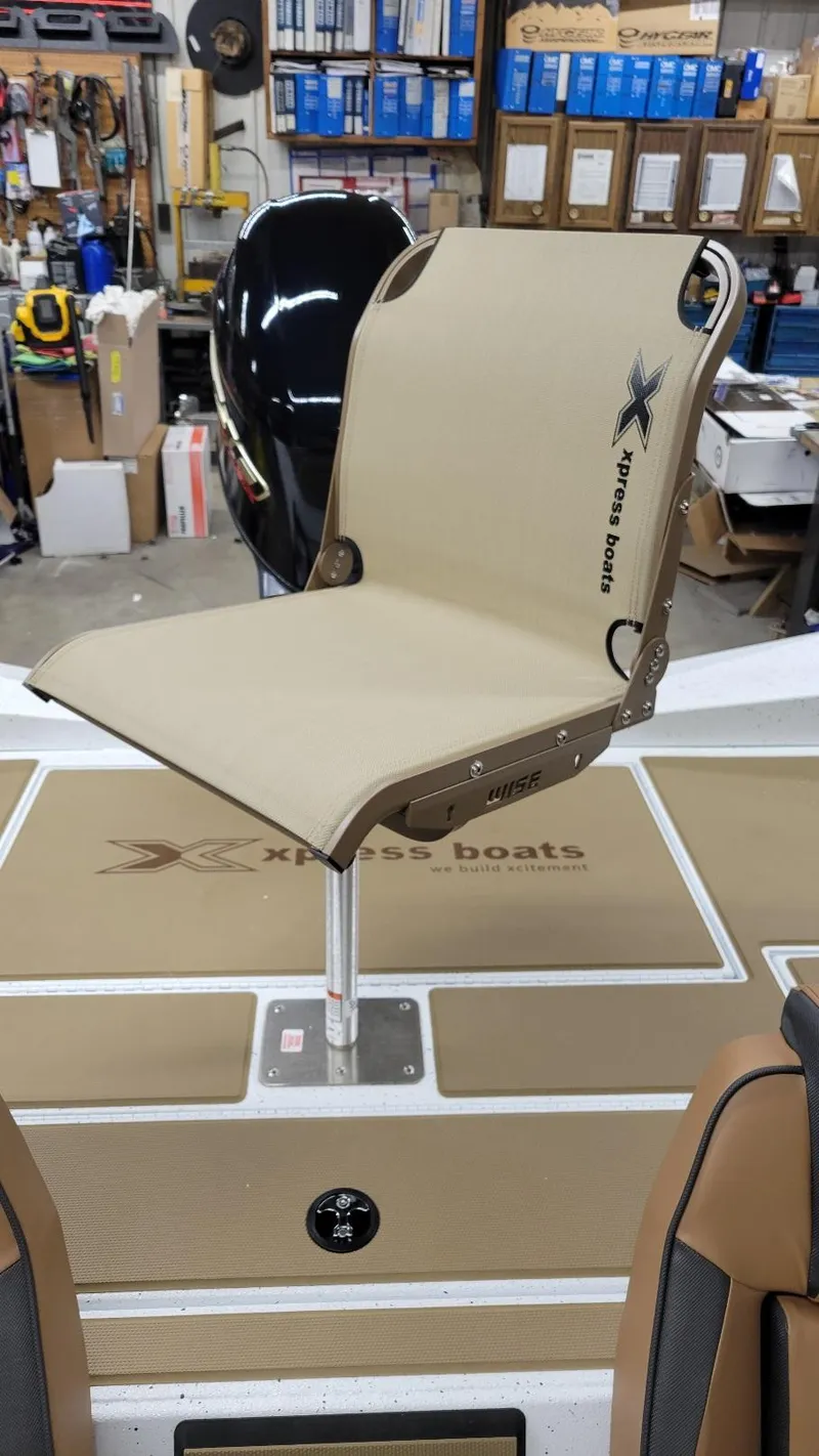Slide: The Image of 2025 Xpress H18C Crappie boat seat with Yamaha Vmax 115 engine in stock. - 6