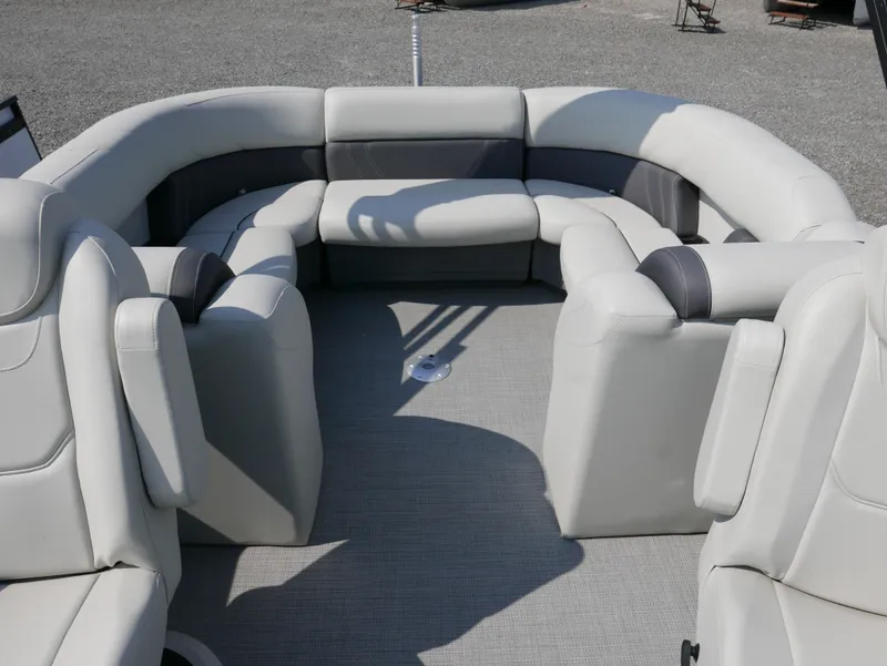 Slide: The Image of 2023 Sylvan Mirage X X3 boat interior with plush seating and modern design. - 16