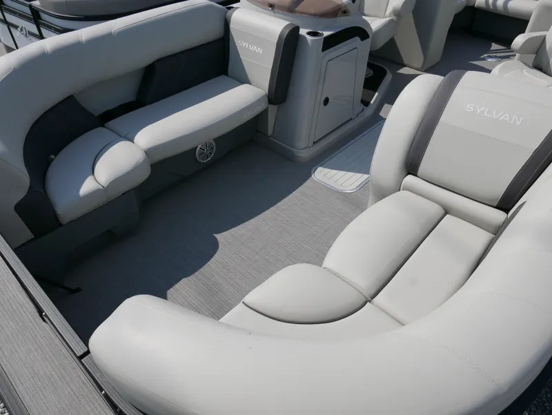 Slide: The Image of 2023 Sylvan Mirage X X3 boat interior with plush seating and modern design. - 5