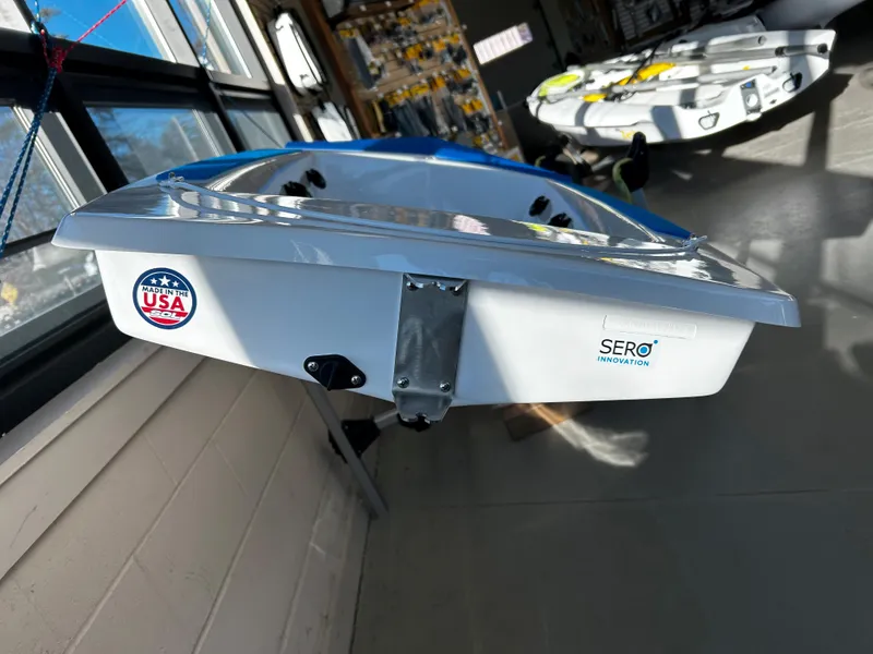 Slide: The Image of 2024 Dinghy Sol Sailboat displayed indoors, featuring USA and SERO Innovation logos. - 6