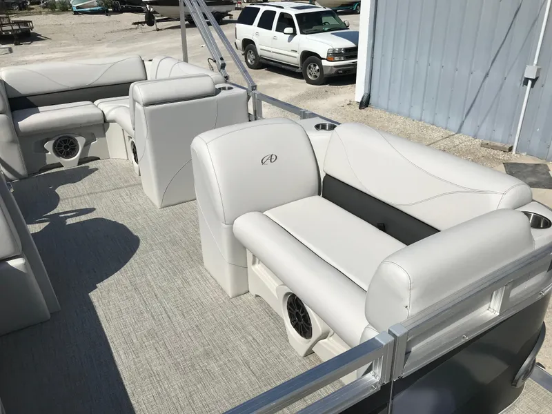 Slide: The Image of 2024 Avalon VTX Cruise pontoon boat with spacious seating and modern design. - 14
