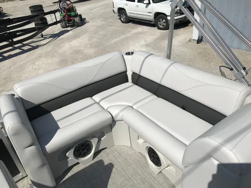 Slide: The Image of 2024 Avalon VTX Cruise boat interior with plush seating and built-in speakers. - 17