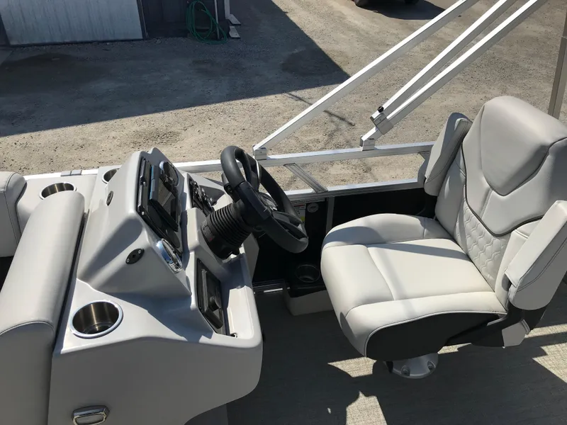 Slide: The Image of 2024 Avalon VTX Cruise boat interior with plush seating and built-in speakers. - 18