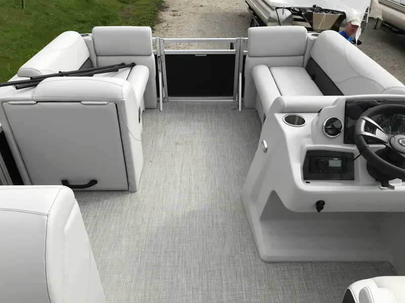 Slide: The Image of 2024 Avalon VTX Cruise pontoon boat on a trailer, side view. - 6