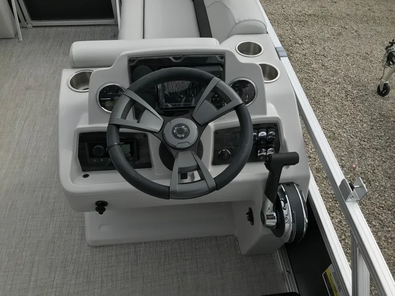 Slide: The Image of 2024 Avalon VTX Cruise boat interior with white and gray seating. - 8