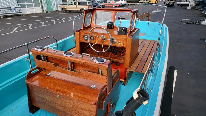 Slide: The Image of 1968 Boston Whaler 16 Sakonnet boat with wooden console and seating. - 5