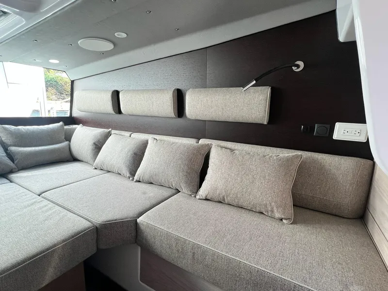 Slide: The Image of Luxurious interior of 2024 Axopar 45 XC Cross Cabin with plush seating and modern design. - 27