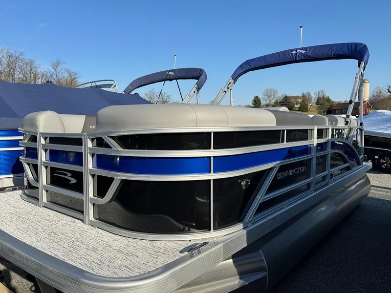 The Image of 2026 Bennington 188 SLJ pontoon boat with blue accents, on order for July delivery. - 1