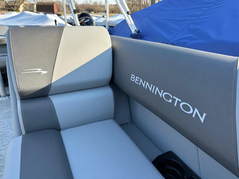 Slide: The Image of Gray and beige seating on a 2026 Bennington 188 SLJ boat, featuring logo embroidery. - 13