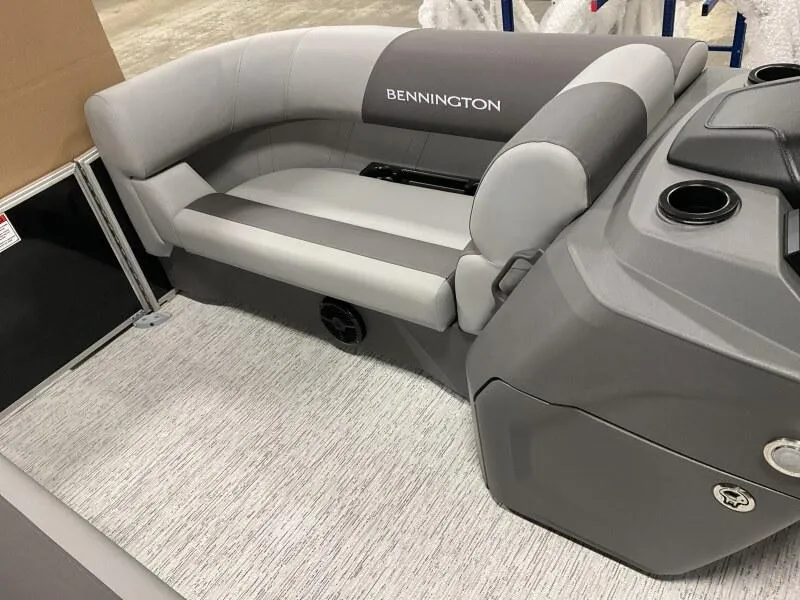 Slide: The Image of 2026 Bennington 188 SLJ boat interior with gray seating and console. - 23