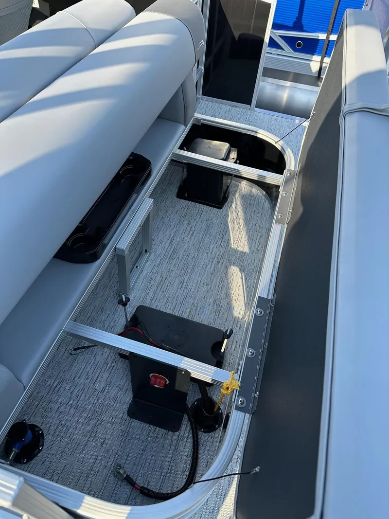 Slide: The Image of Interior view of 2026 Bennington 188 SLJ boat, showcasing seating and storage area. - 35