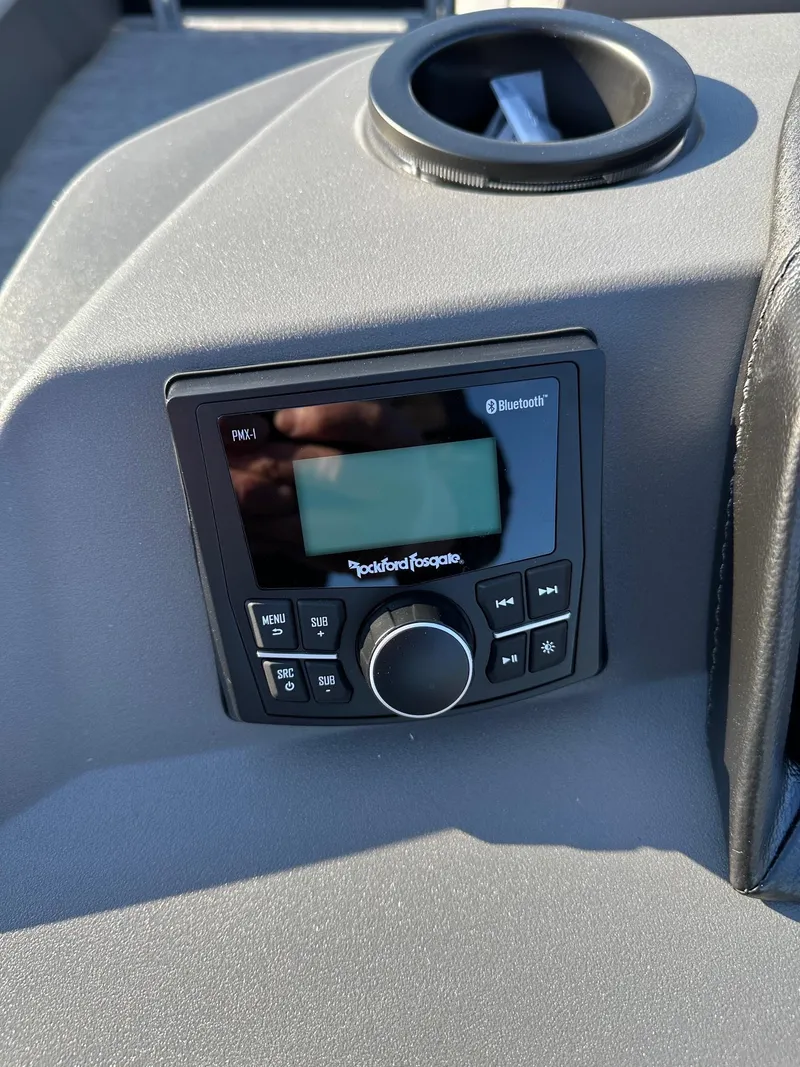 Slide: The Image of Rockford Fosgate Bluetooth stereo system on Bennington 188 SLJ boat dashboard, 2026 model. - 38