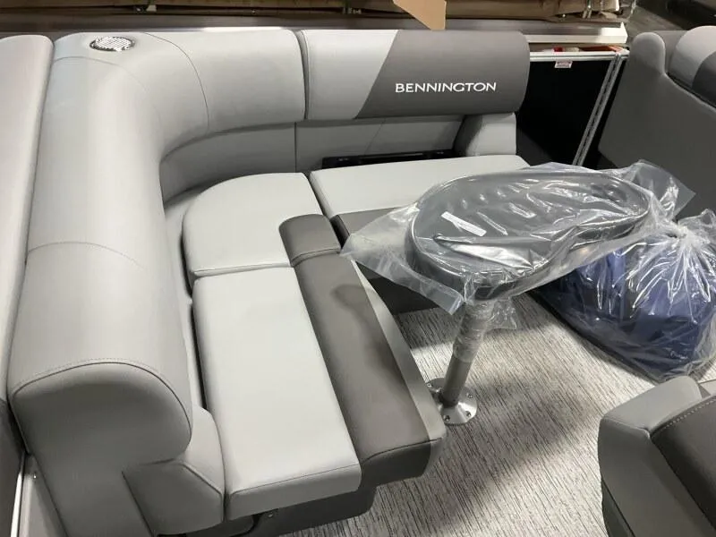 Slide: The Image of Luxurious seating area of 2026 Bennington 188 SLJ boat, featuring sleek gray upholstery. - 44