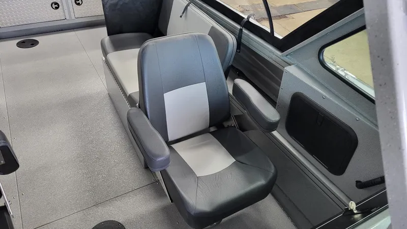 Slide: The Image of Interior of 2025 Smoker Craft Phantom 20 X2 offshore boat, featuring comfortable seating. - 13