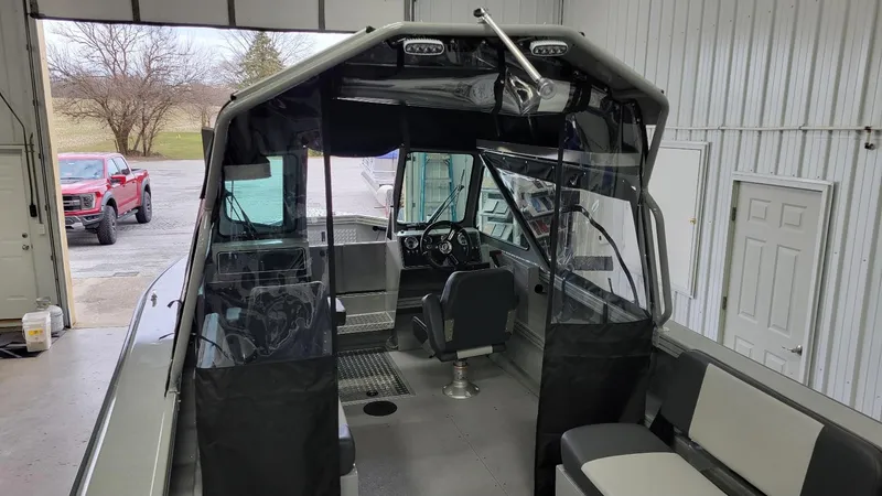 Slide: The Image of 2025 Smoker Craft Phantom 20 X2 offshore boat interior with Yamaha Vmax 250 SHO engine. - 23