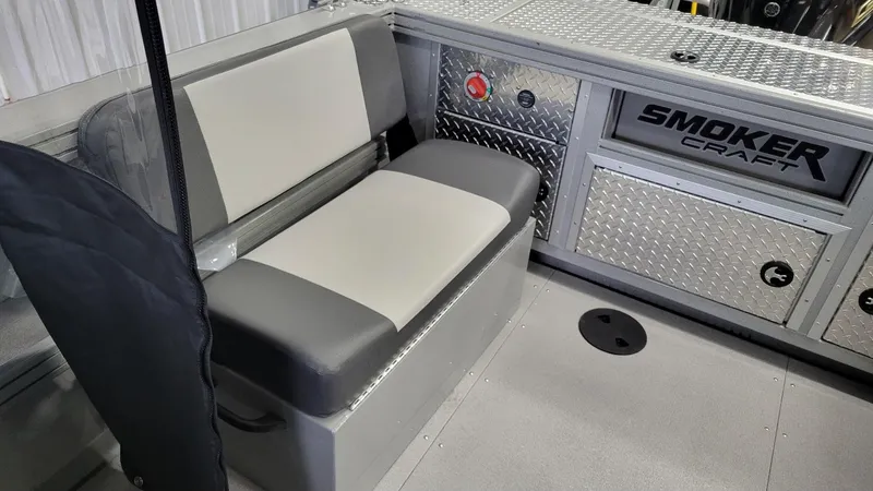 Slide: The Image of 2025 Smoker Craft Phantom 20 X2 interior with seating and storage compartments. - 25
