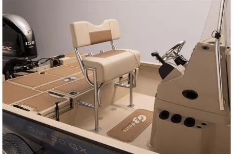 Slide: The Image of 2024 G3 Bay 20 GX boat interior with seating and steering console. - 5