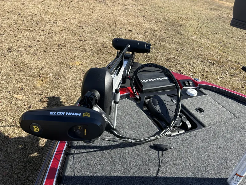 Slide: The Image of 2024 Triton 20XP boat deck with Minn Kota trolling motor and Humminbird electronics. - 17