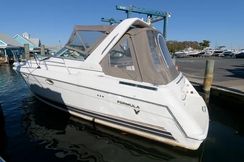 The Image of 2002 Formula 31 PC boat docked at marina. - 0
