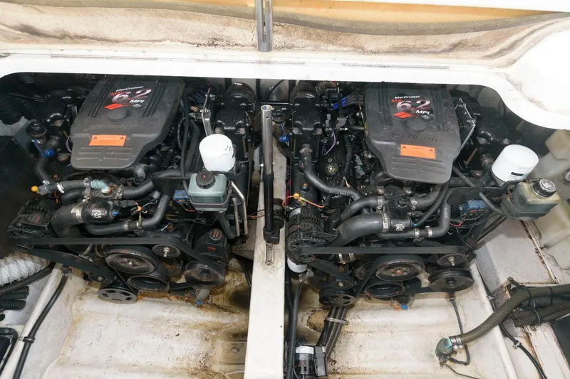 Slide: The Image of Twin MerCruiser engines in a 2002 Formula 31 PC boat. - 13