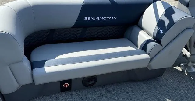 Slide: The Image of 2024 Bennington 22 SSR pontoon boat with cover in a warehouse. - 15