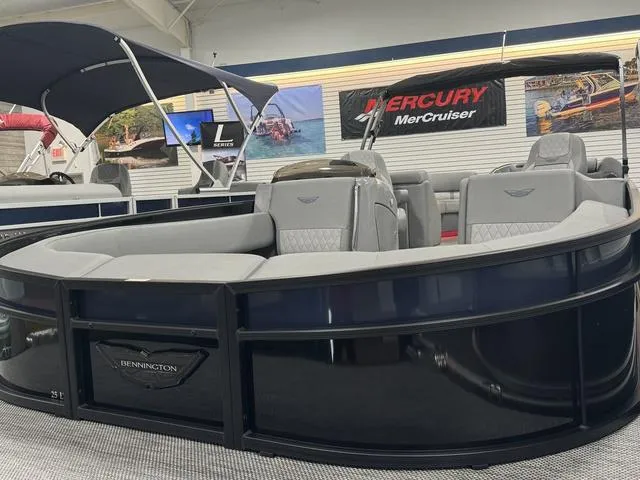 Slide: The Image of 2024 Bennington 25 LTFB boat battery compartment with wiring and storage. - 10