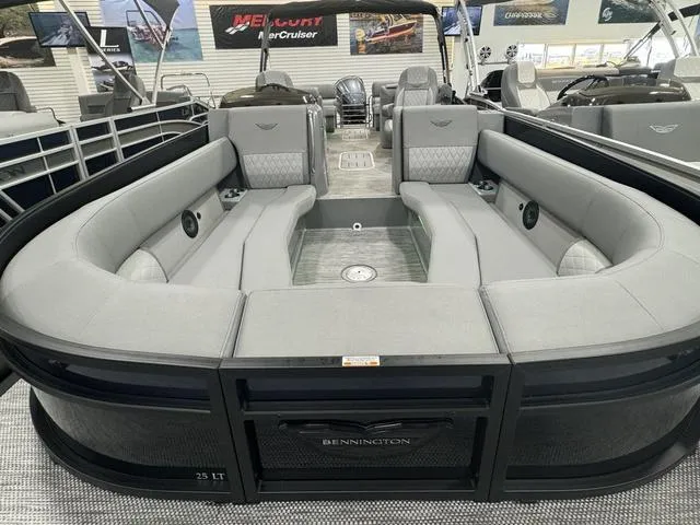 Slide: The Image of 2024 Bennington 25 LTFB pontoon boat in a workshop. - 3