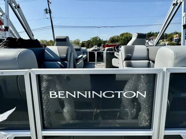 Slide: The Image of 2024 Bennington 22 SSR pontoon boat in a warehouse. - 15